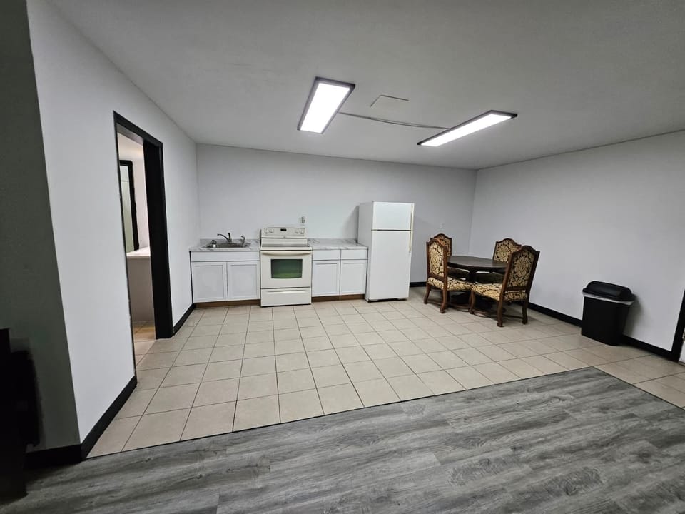 Family Triple Room | Living area | 32-inch LCD TV with digital channels, TV