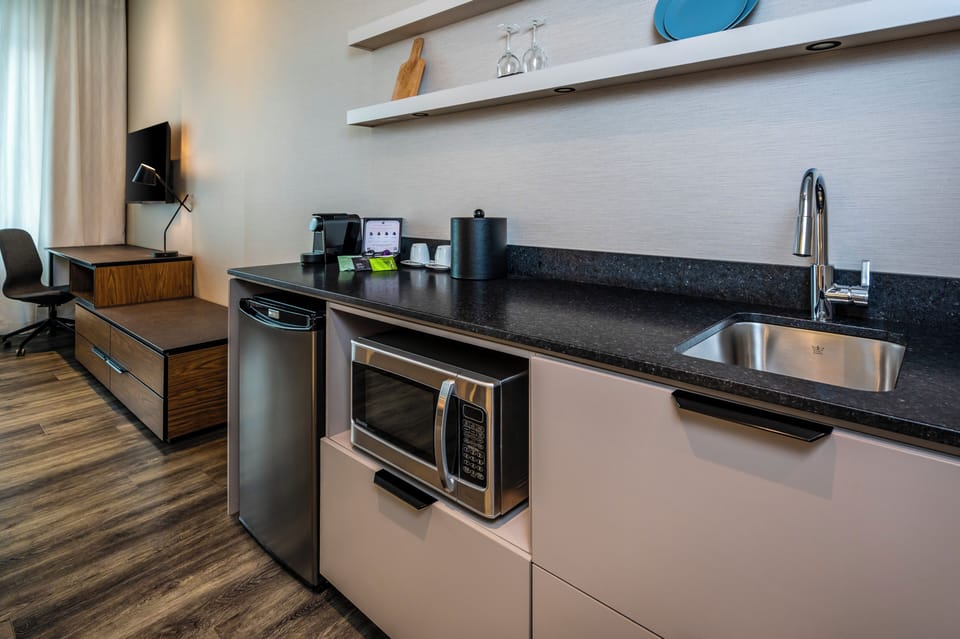 Suite, 1 King Bed, Non Smoking (Efficiency) | In-room dining