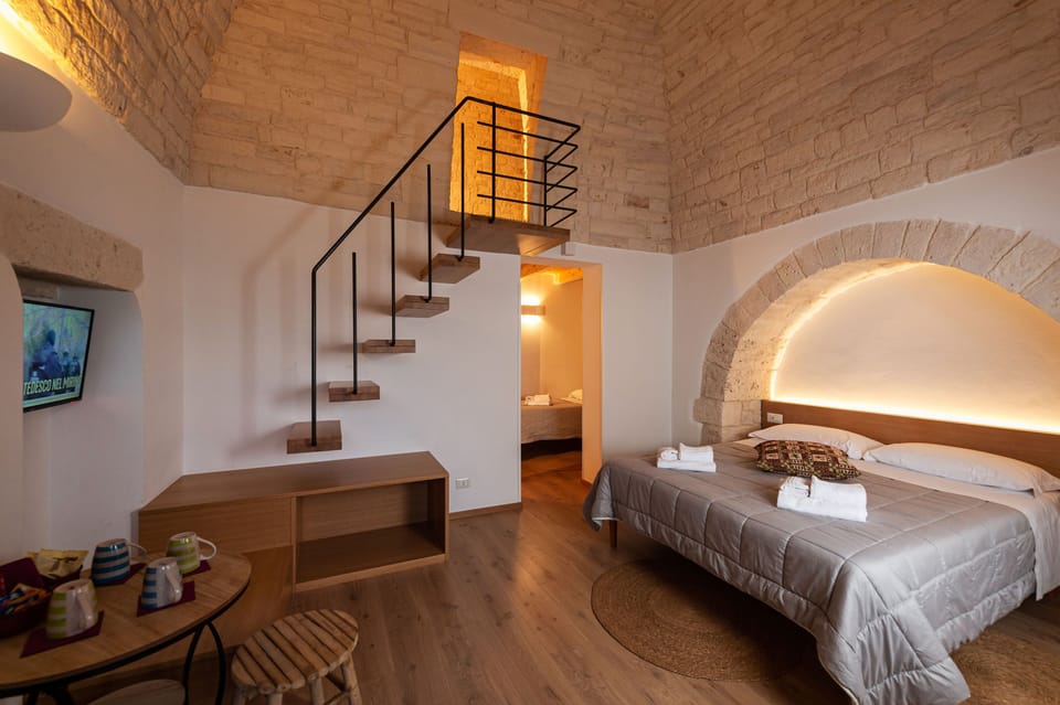 Quadruple Room (Dimora Rosa) | Down comforters, travel crib, free WiFi, bed sheets