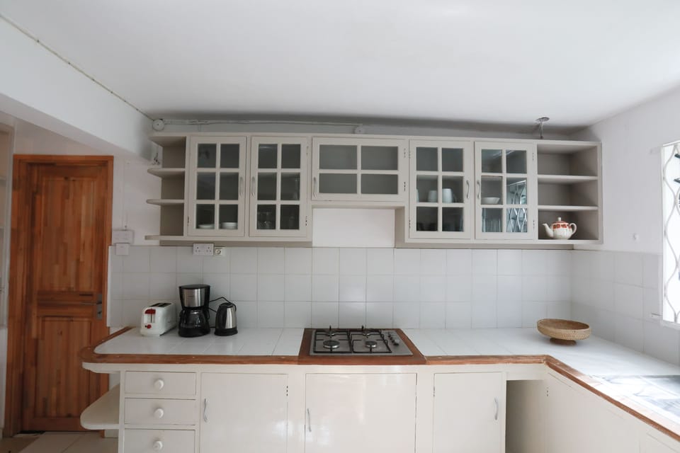 Apartment, 2 Bedrooms (Garden Side) | Private kitchen | Fridge, electric kettle