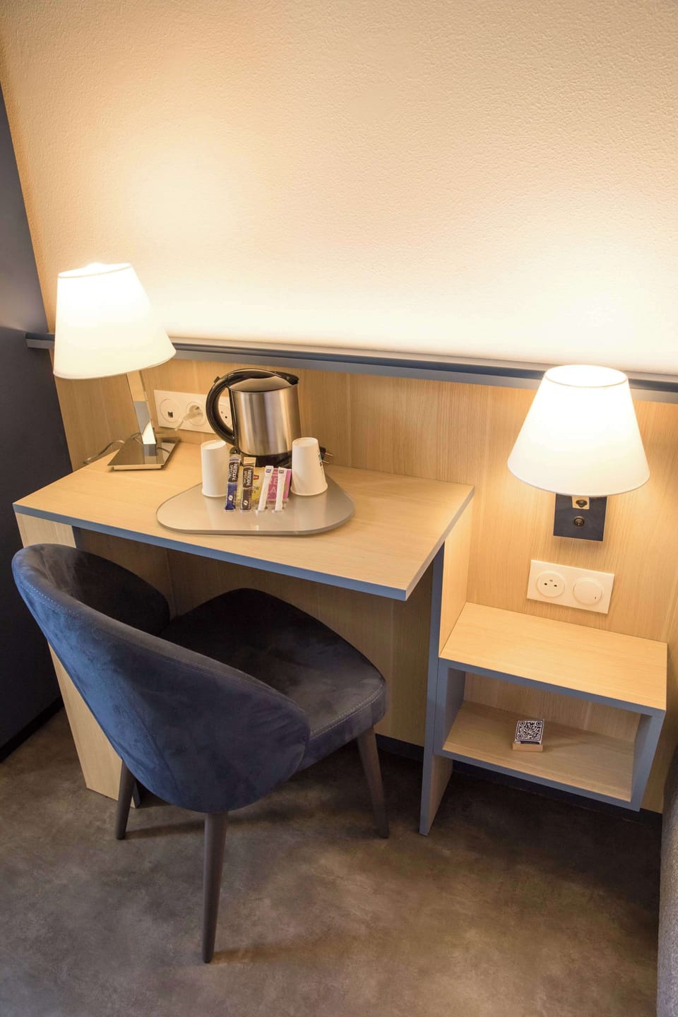 Premium bedding, desk, laptop workspace, blackout drapes