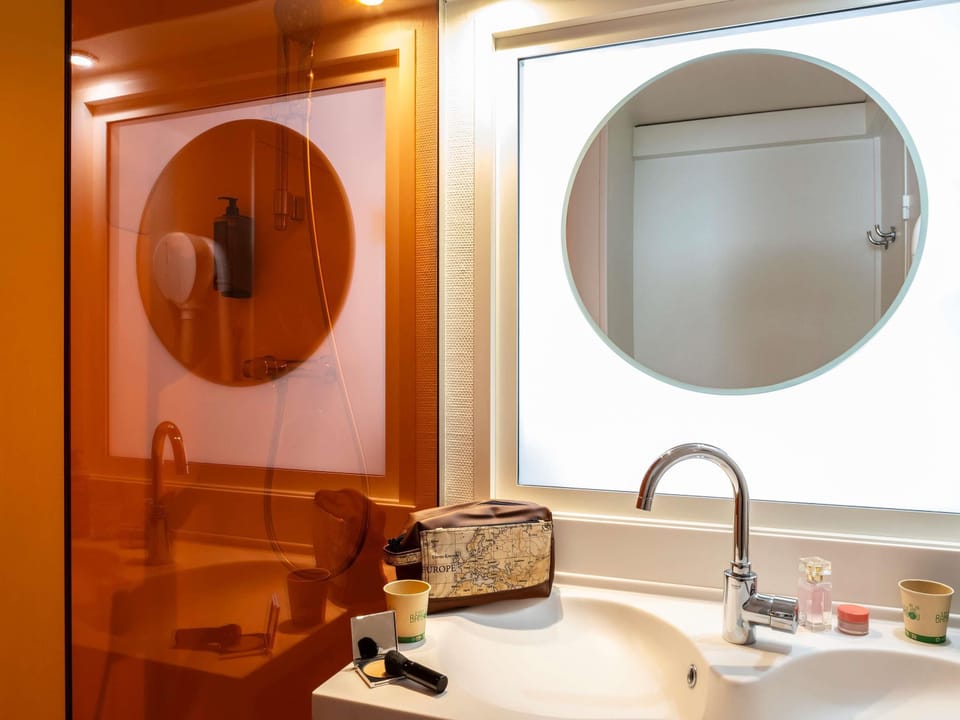 Eco-friendly toiletries, hair dryer, towels, soap