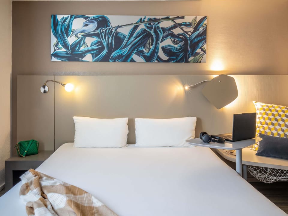 Premium bedding, blackout drapes, soundproofing, iron/ironing board