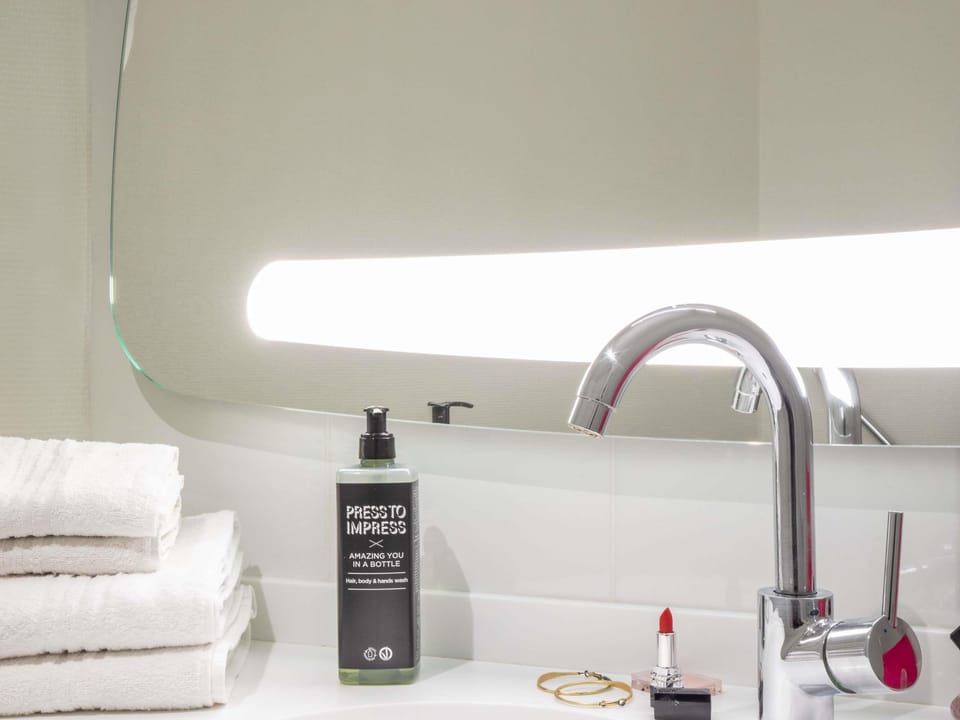 Premium bedding, blackout drapes, soundproofing, iron/ironing board