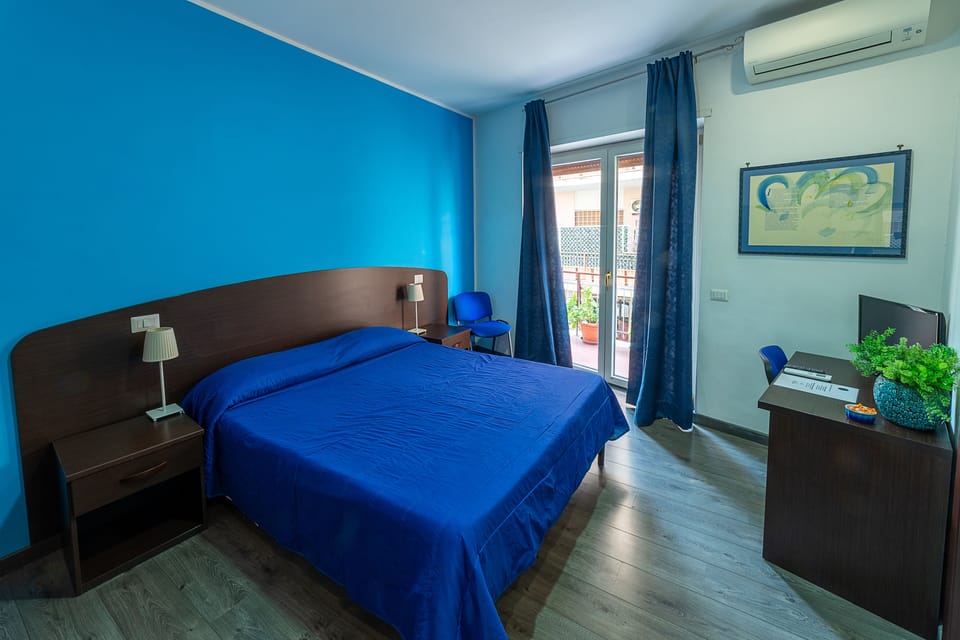 Comfort Double Room, Private Bathroom | Down comforters, memory foam beds, desk, blackout drapes