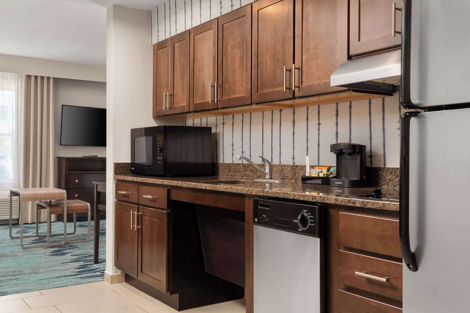 Studio, 1 King Bed, Accessible (Mobility & Hearing, Roll-in Shower) | Private kitchen | Coffee/tea maker, full-size fridge, microwave, stovetop