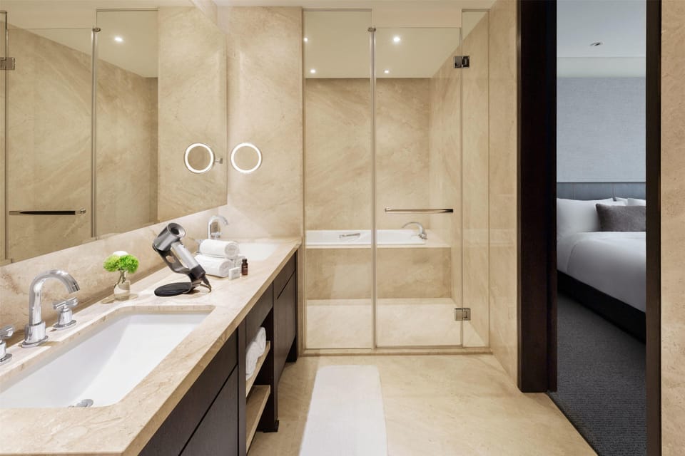 Separate tub and shower, deep soaking tub, designer toiletries