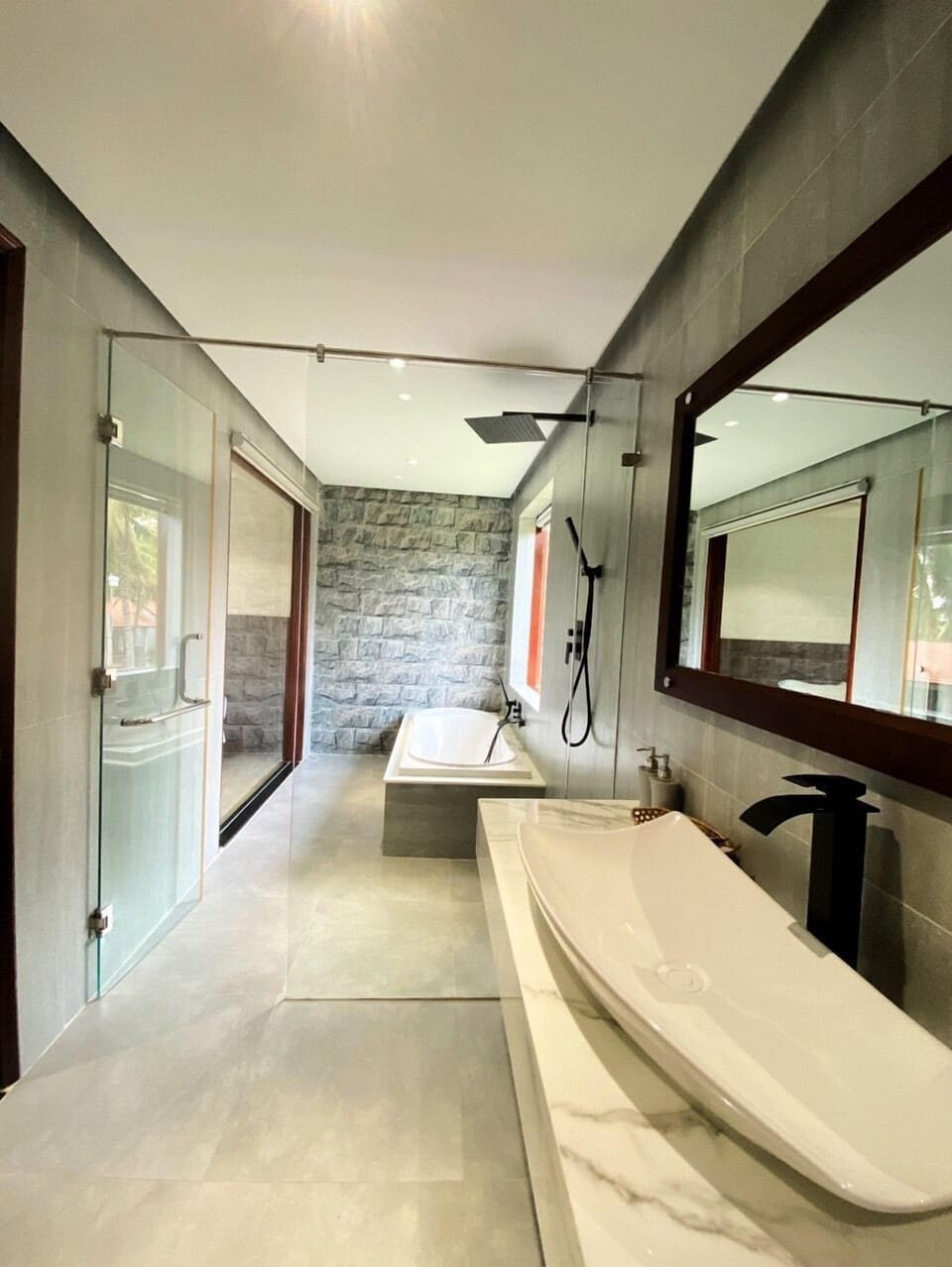 Bungalow Suite, Beachfront | Bathroom | Rainfall showerhead, free toiletries, hair dryer, slippers