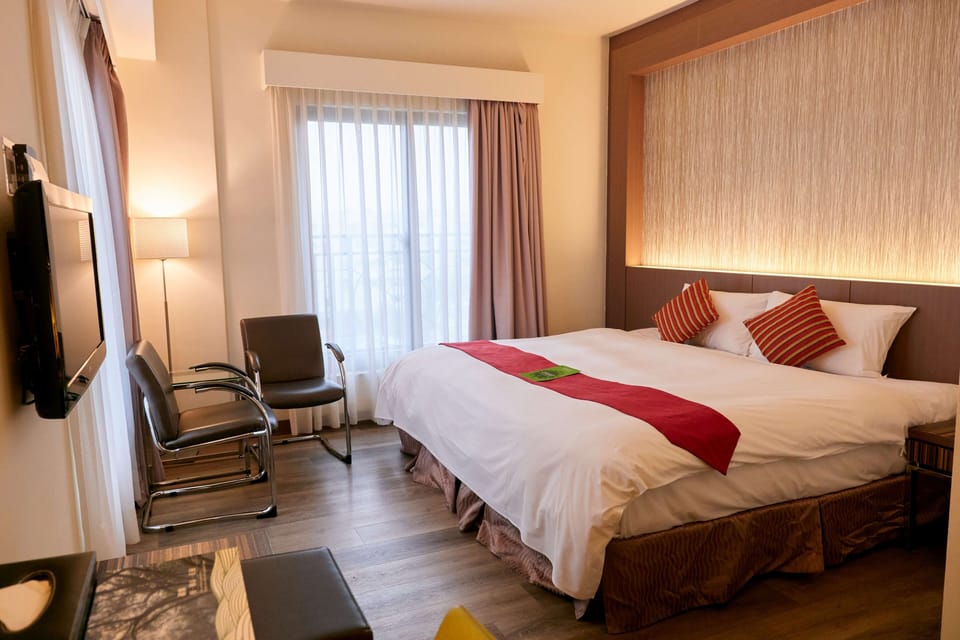 Down comforters, pillowtop beds, in-room safe, desk