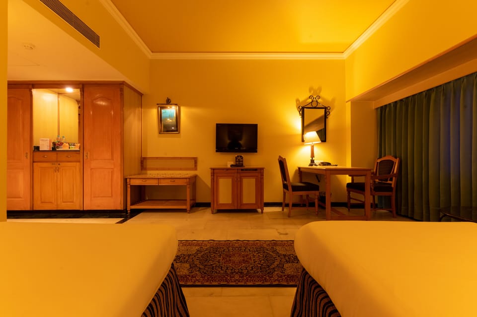 Free minibar items, in-room safe, desk, laptop workspace