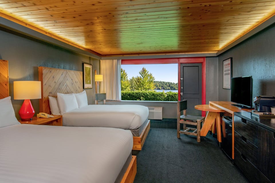 Deluxe Room, 2 Queen Beds, Patio | Premium bedding, pillowtop beds, blackout drapes, iron/ironing board