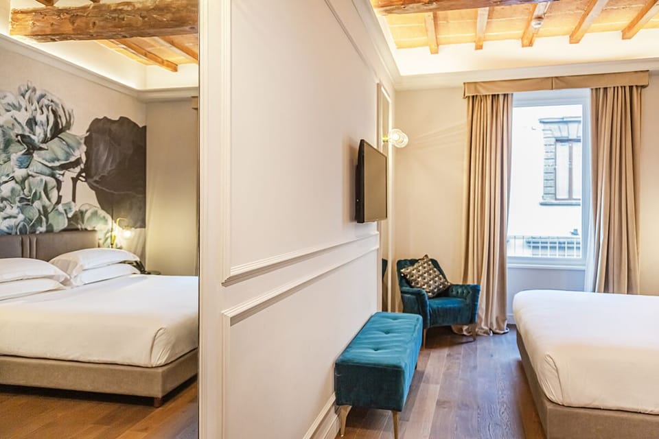 Camera Quadrupla Suite | Premium bedding, down comforters, minibar, individually decorated