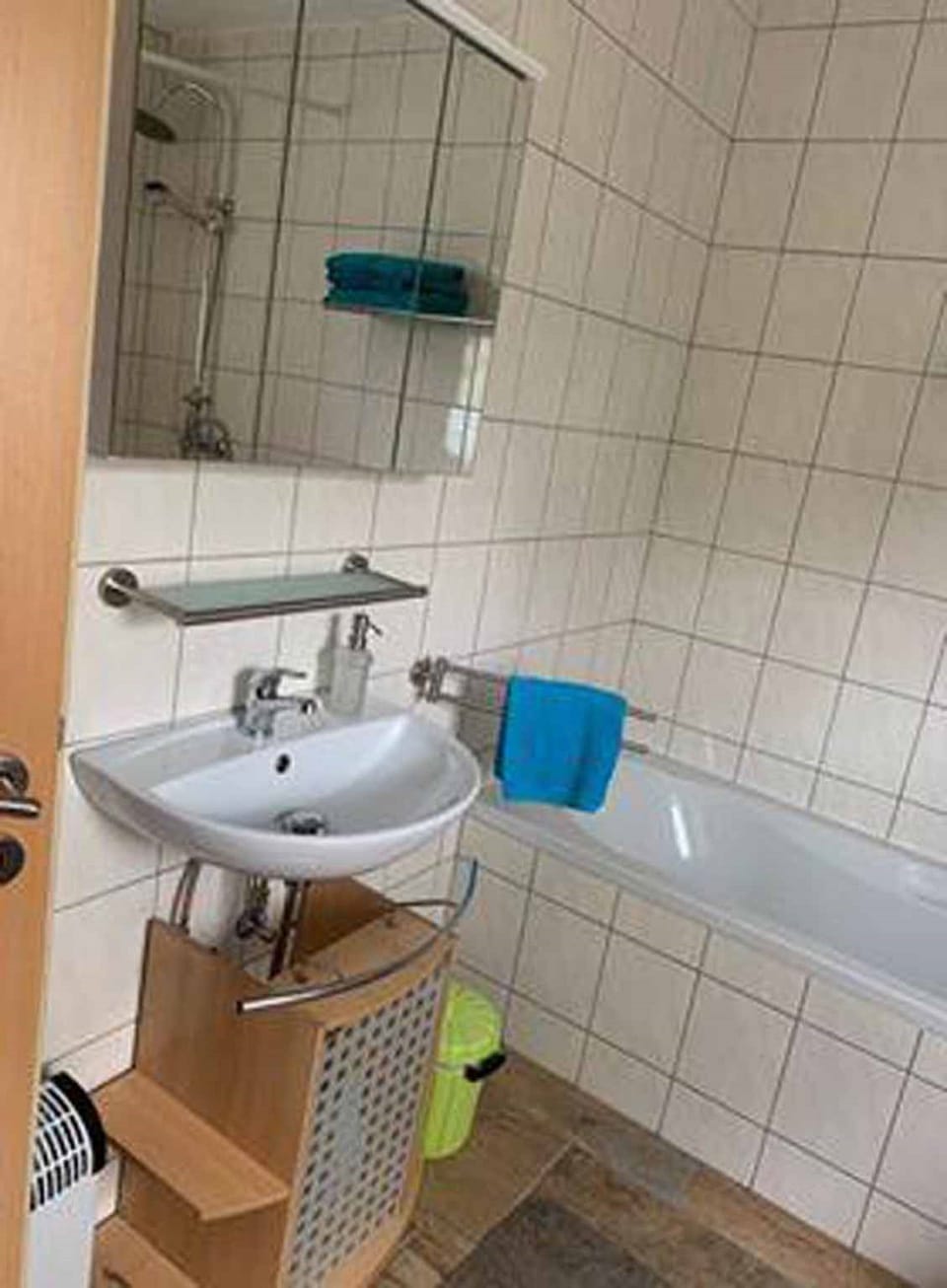 Apartment | Bathroom | Separate tub and shower, hair dryer, towels, toilet paper
