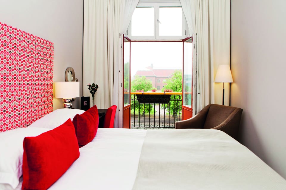 Standard Double Room | Minibar, in-room safe, desk, blackout drapes