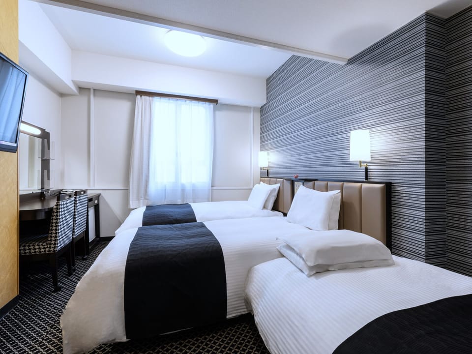 Desk, blackout drapes, free WiFi, bed sheets