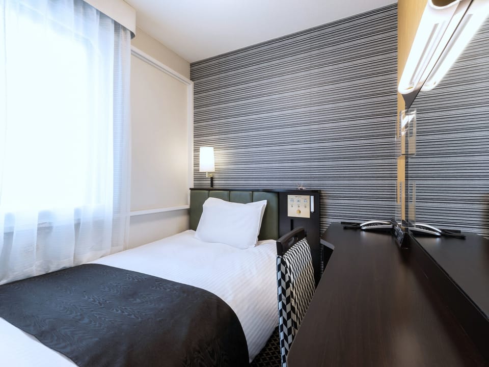 Desk, blackout drapes, free WiFi, bed sheets