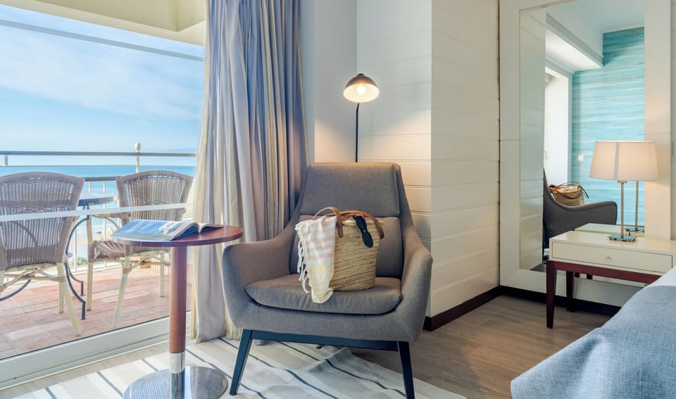 Superior Double or Twin Room, Sea View | Minibar, in-room safe, desk, blackout drapes
