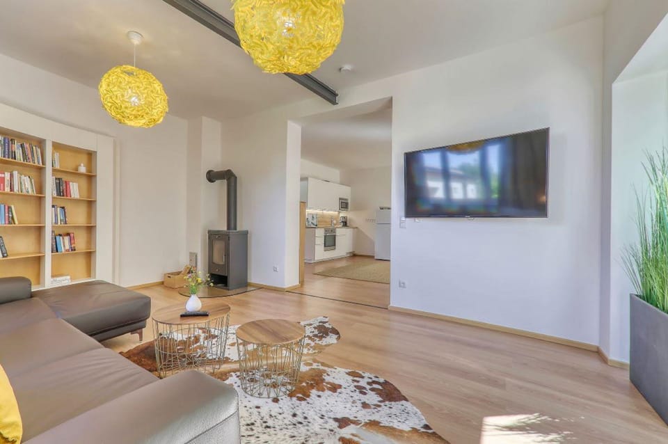 Comfort House, 3 Bedrooms, Sauna | Living area | Flat-screen TV, fireplace