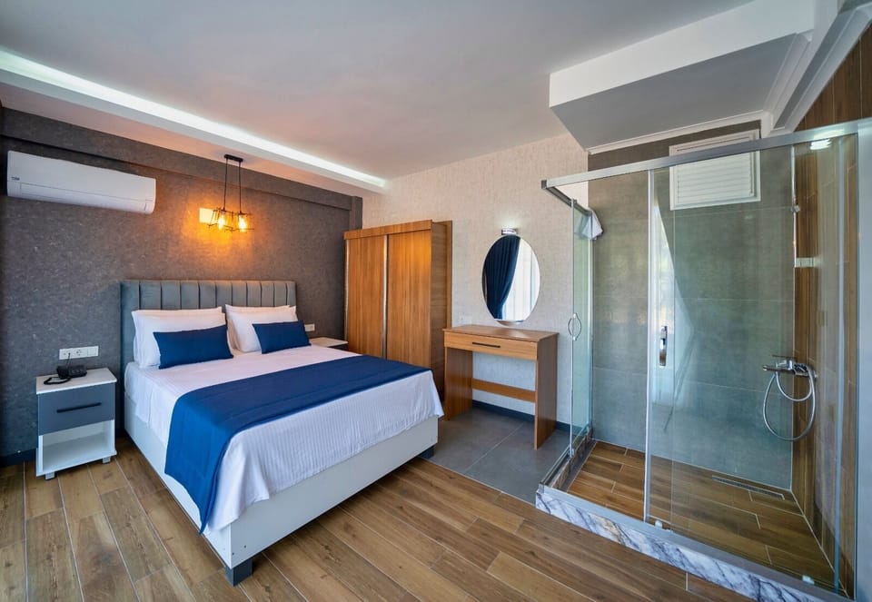 Deluxe Suite, 2 Bedrooms, Non Smoking, City View | Tempur-Pedic beds, in-room safe, blackout drapes, soundproofing