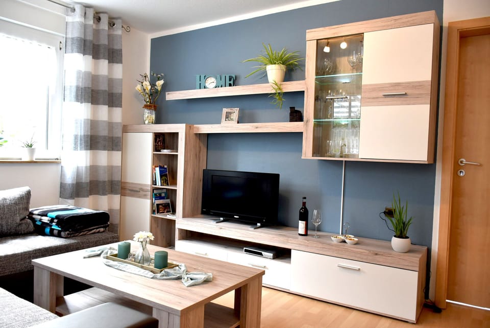 Condo, Patio | Living area | 42-inch TV with satellite channels, DVD player
