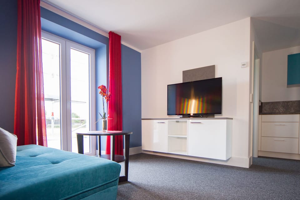 Apartment, Terrace | Living area | 42-inch flat-screen TV with satellite channels, TV