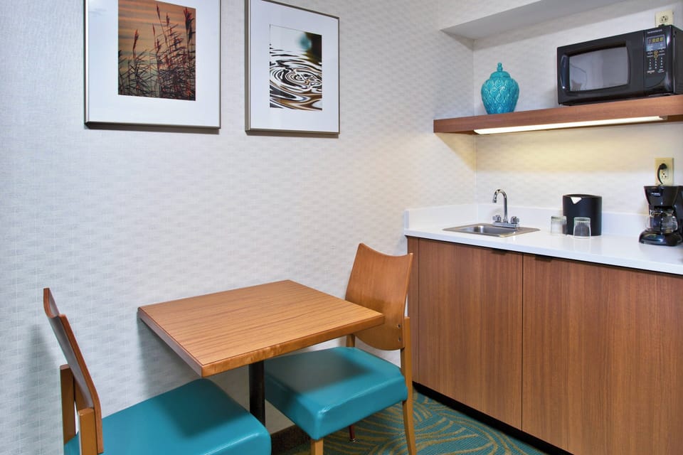 Suite, 2 Double Beds | Private kitchen | Mini-fridge, microwave, coffee/tea maker