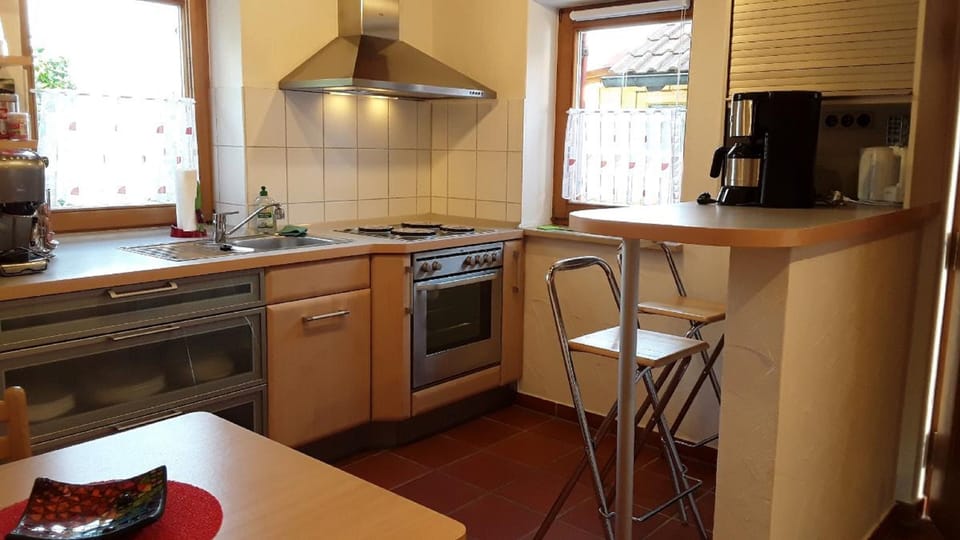 Oven, stovetop, cookware/dishes/utensils, cleaning supplies