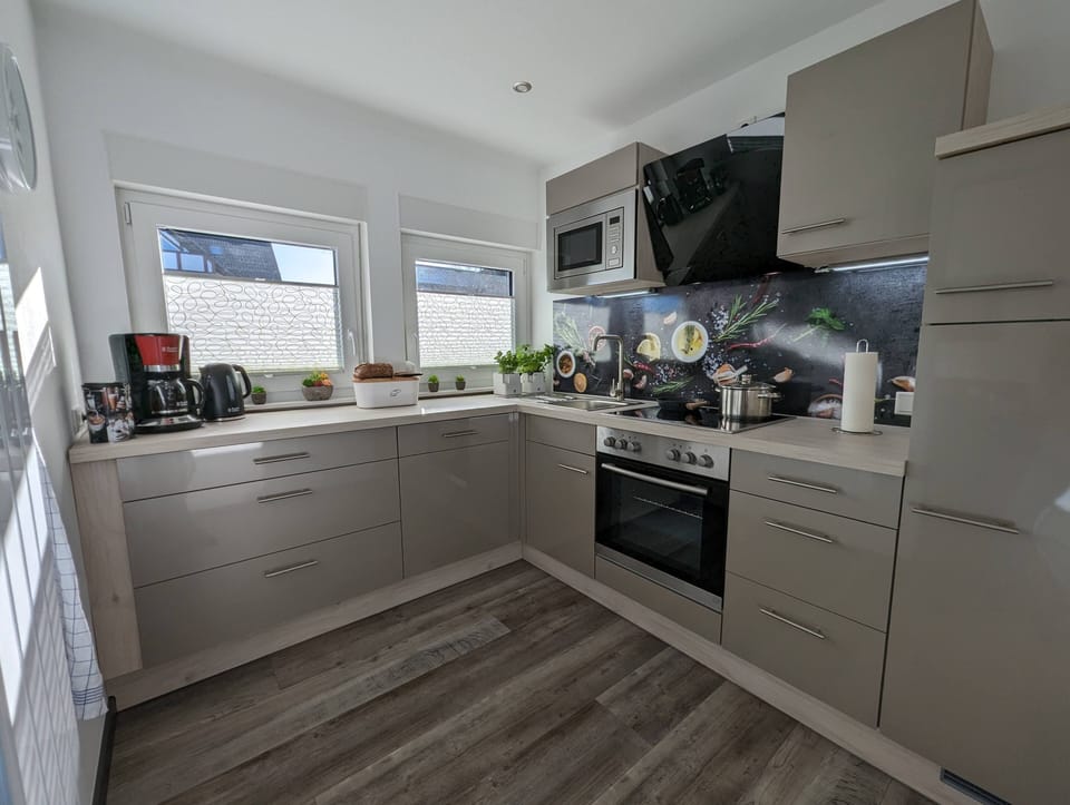 Apartment | Private kitchen | Fridge, oven, stovetop, dishwasher