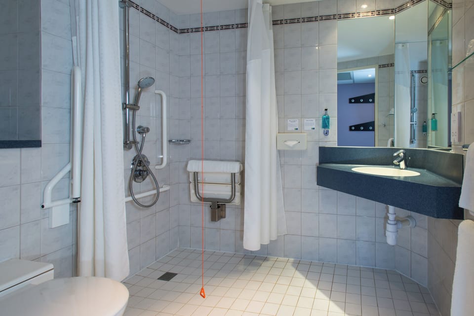 Shower, eco-friendly toiletries, hair dryer, towels