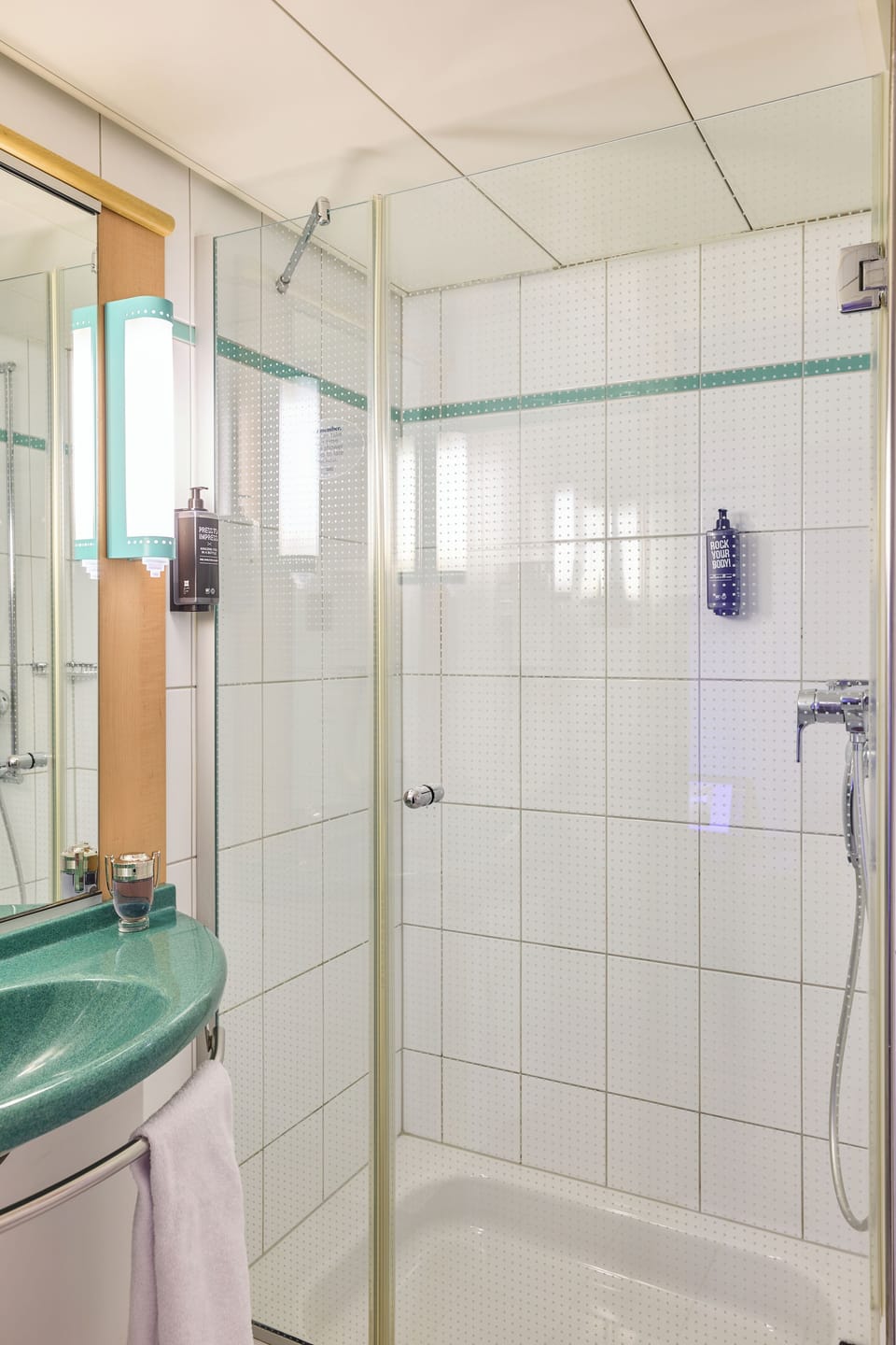 Shower, eco-friendly toiletries, hair dryer, towels