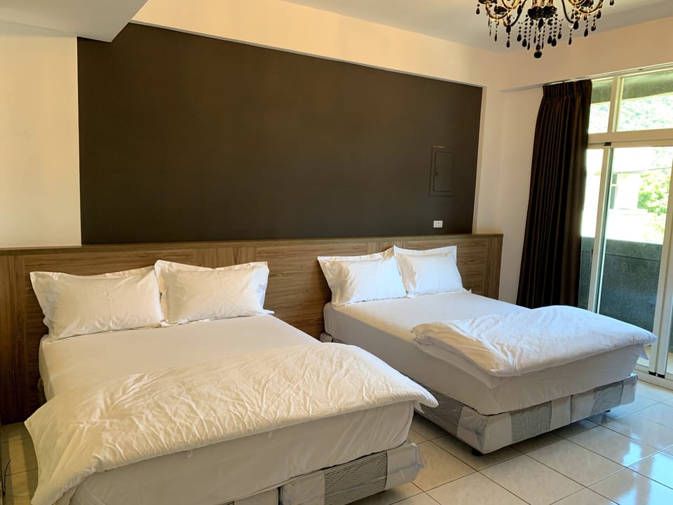Blackout drapes, free WiFi, bed sheets