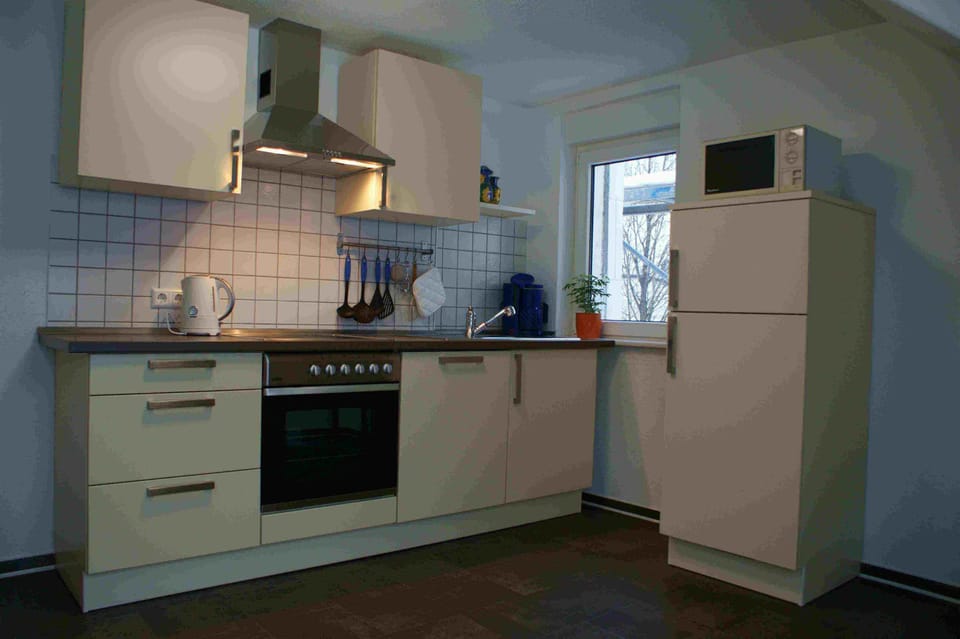 Apartment, 2 Bedrooms, Patio | Private kitchen | Fridge, microwave, oven, stovetop