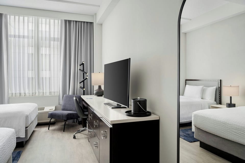 Room, 2 Double Beds, Hearing Accessible | Pillowtop beds, desk, blackout drapes, iron/ironing board