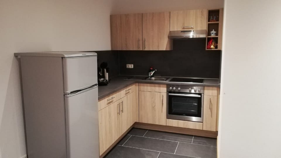 Apartment, Patio | Private kitchen | Stovetop, coffee/tea maker, highchair