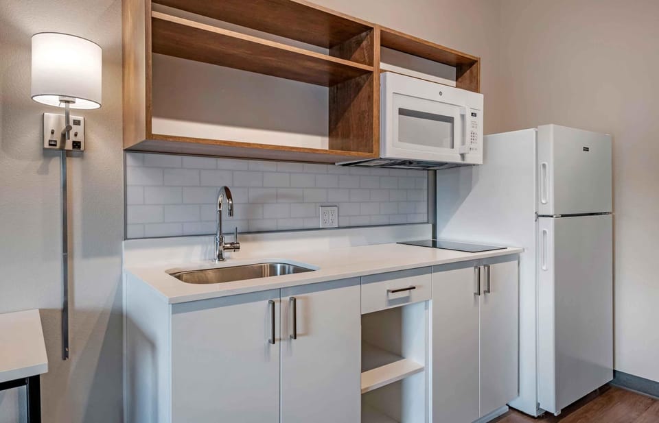 Standard Studio, 1 Queen Bed, Non Smoking | Private kitchen | Full-size fridge, microwave, stovetop, cookware/dishes/utensils