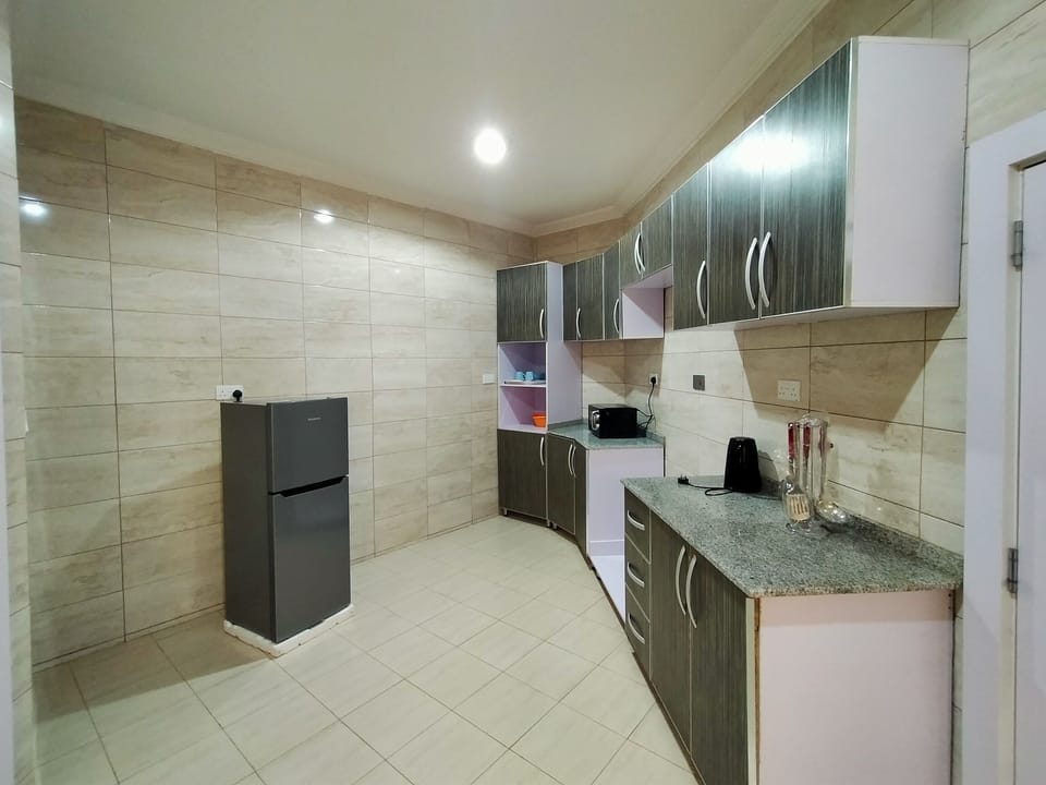 Apartment | Private kitchen | Fridge, microwave, electric kettle, cookware/dishes/utensils
