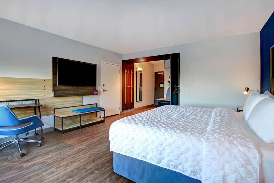 Down comforters, pillowtop beds, desk, laptop workspace