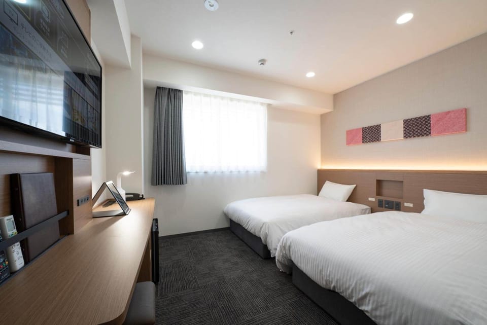 Down comforters, desk, free WiFi, bed sheets