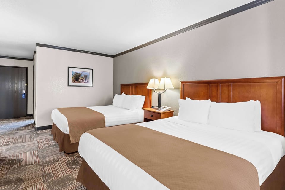 Standard Room, 2 Queen Beds, Non Smoking, Refrigerator & Microwave | Desk, laptop workspace, free WiFi, bed sheets