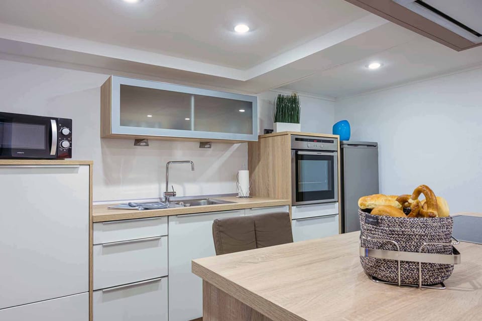 Apartment | Private kitchen | Fridge, microwave, oven, stovetop