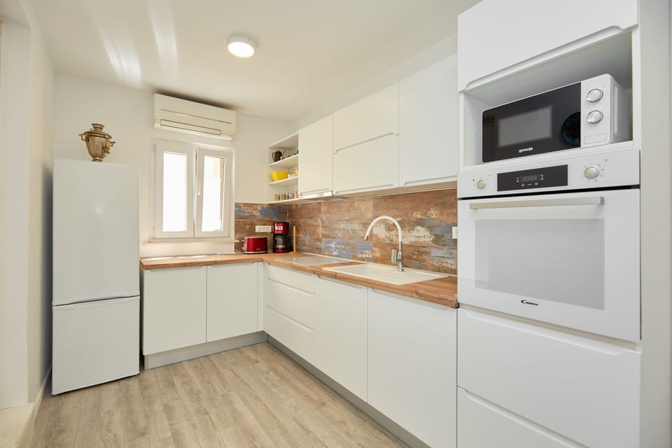 House (3 Bedroom HH with Garden and Sea View) | Private kitchen | Fridge
