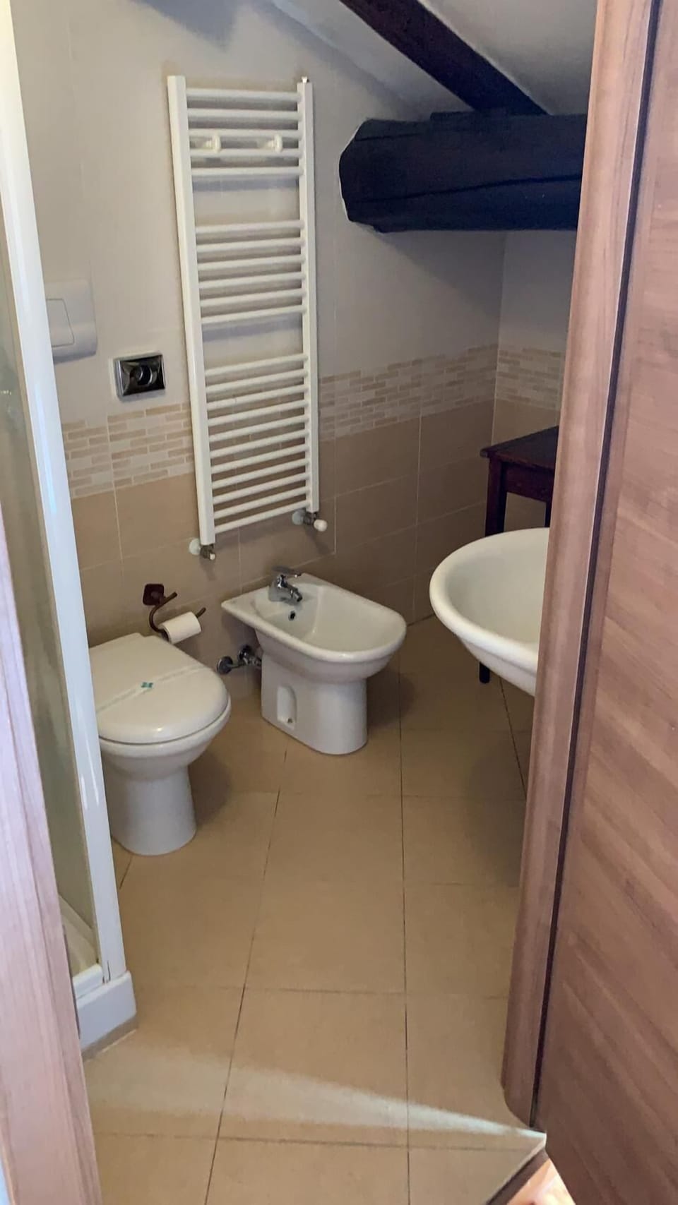 Triple Room | Bathroom | Shower, hair dryer, bidet, towels