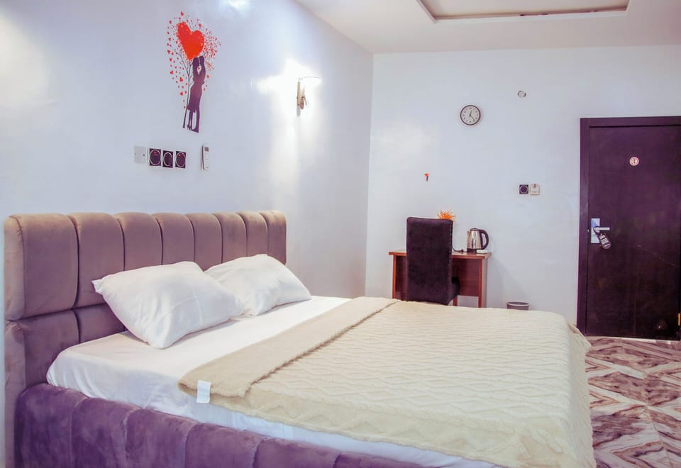 Standard Room | Down comforters, individually decorated, desk, laptop workspace