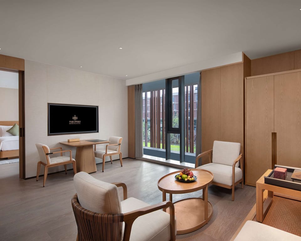 Collection Suite with 1 King Bed | Premium bedding, down comforters, Select Comfort beds