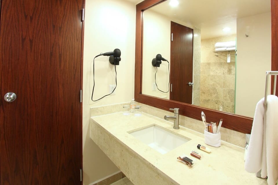Shower, rainfall showerhead, towels, soap
