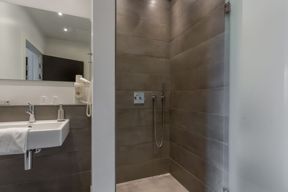 Eco-friendly toiletries, hair dryer, towels, soap