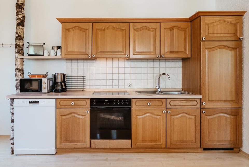 Apartment, 2 Bedrooms | Private kitchen | Fridge, oven, stovetop, dishwasher