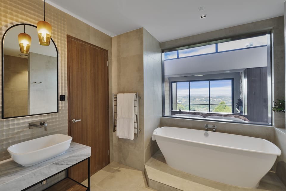 Luxury Room, 1 King Bed, Fireplace, Valley View | Bathroom | Separate tub and shower, rainfall showerhead, bathrobes, slippers