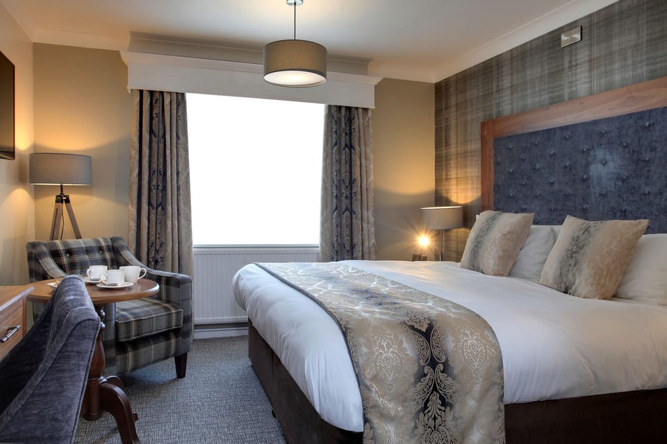 Hypo-allergenic bedding, in-room safe, desk, laptop workspace