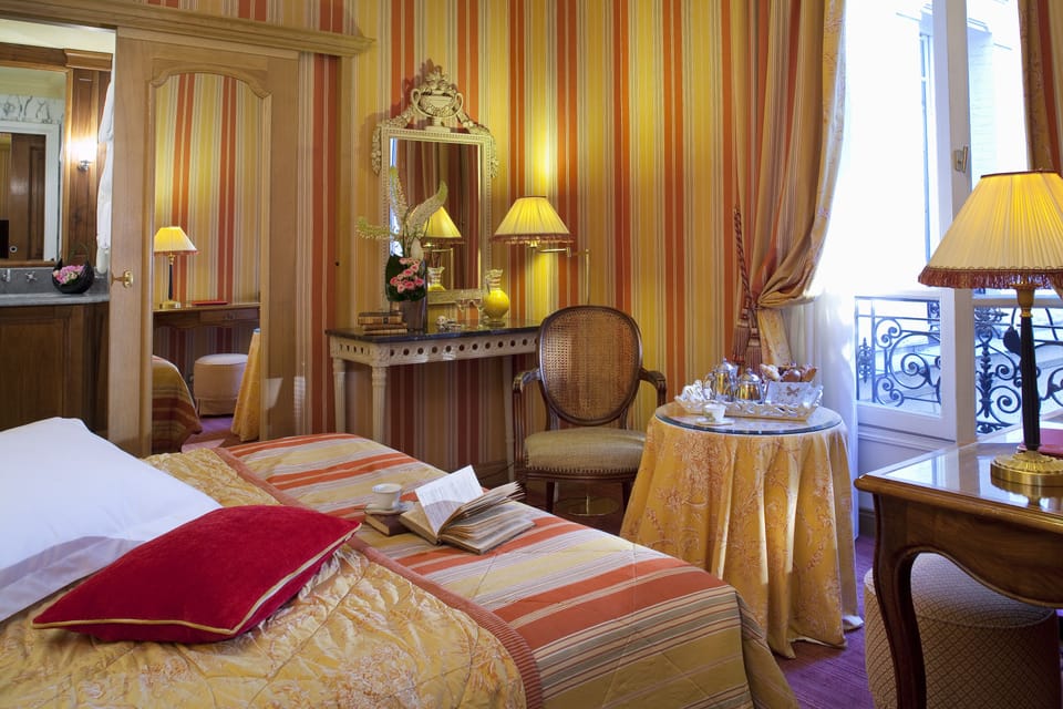 Standard Double Room | Minibar, in-room safe, individually decorated, desk